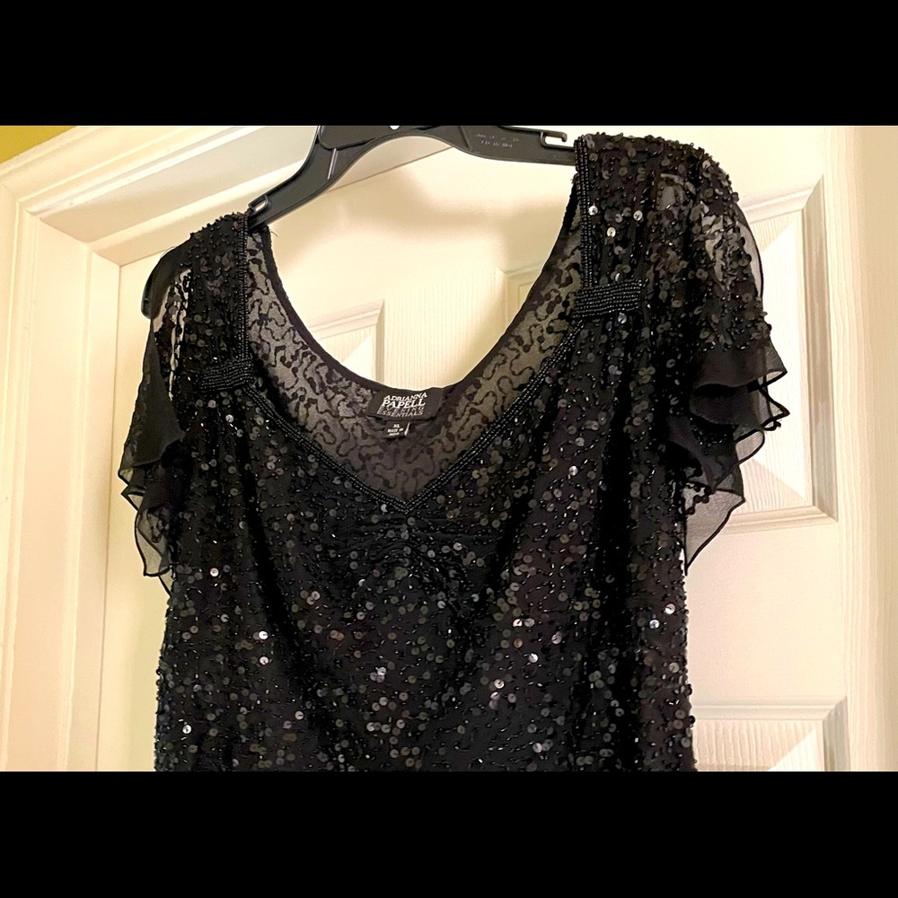 Versatile elegant blouse. Can be worn to different occasions